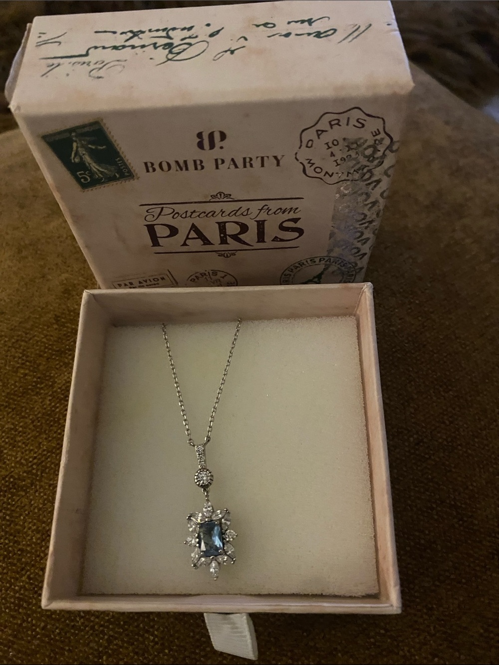BP  Necklace lab created aquamarine and white topaz on rhodium plated